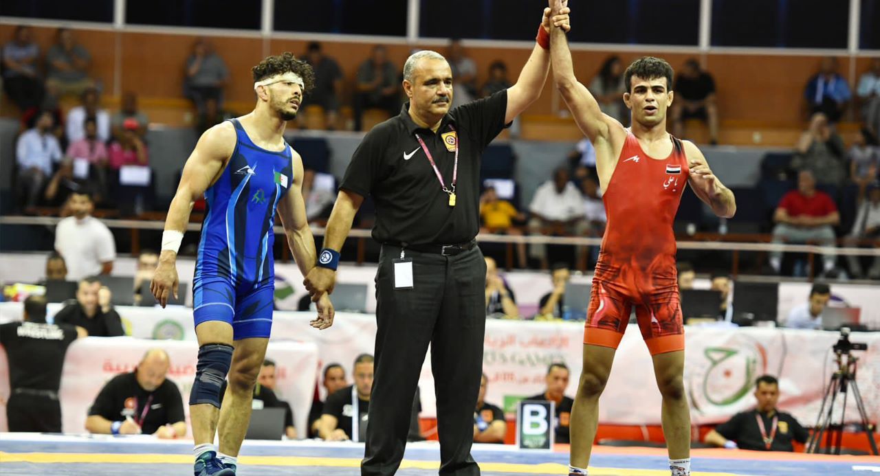 الدورة الرياضية العربية بالجزائر.. العراق يحصل على ميداليات الذهب بالمصارعة لوزن 65 كغم و74 كغم