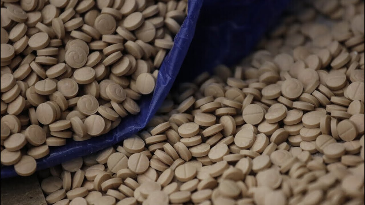 الإطاحة بأكبر شبكة لتجارة المخدرات ببغداد بحوزتهم 221 كيلوغراماً من الحبوب المخدرة