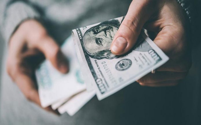 انخفاض أسعار صرف الدولار في بورصة الكفاح