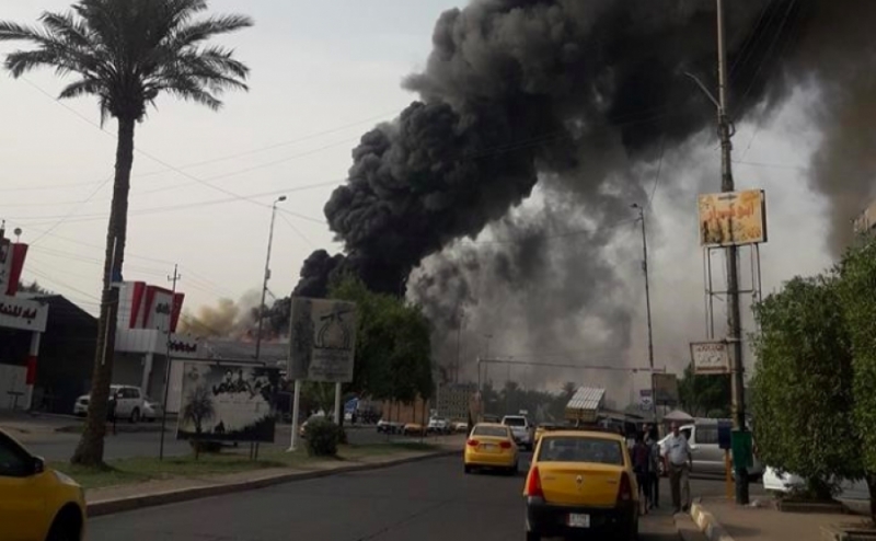 اخماد حريق شقتين وسط بغداد وإنقاذ العوائل المحاصرة