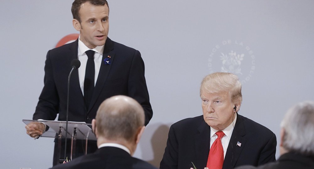 بوتين يقول إنه تحدث مع ترامب في باريس