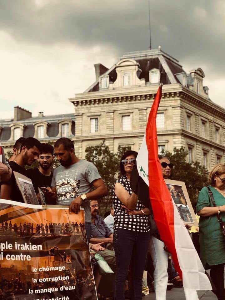 بالصور .. الجالية العراقية في باريس تنظم وقفة دعما للتظاهرات في الجنوب